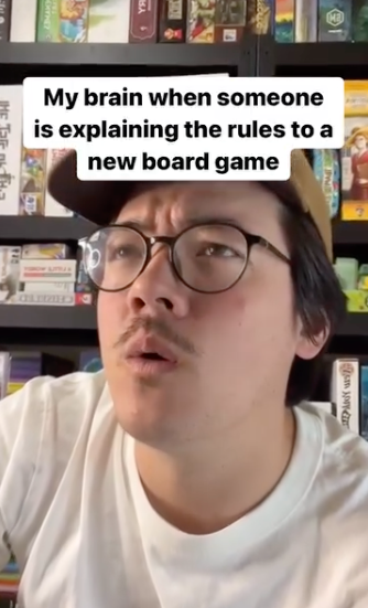 Confused player at a board game table
